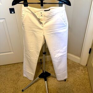 White, ankle dress slacks, cute ruffle on pocket. Like new condition.